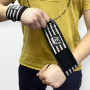 Кистьові бинти EasyFit 50х8 см фіксатор на зап’ястя (чорно-білі) Кистьові бинти EasyFit 50х8 см фіксатор на зап’ястя (чорно-білі)
